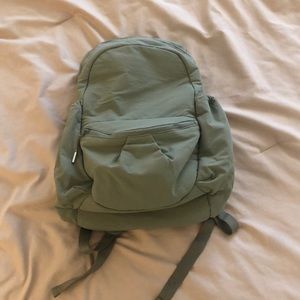 Olive green Athleta backpack.